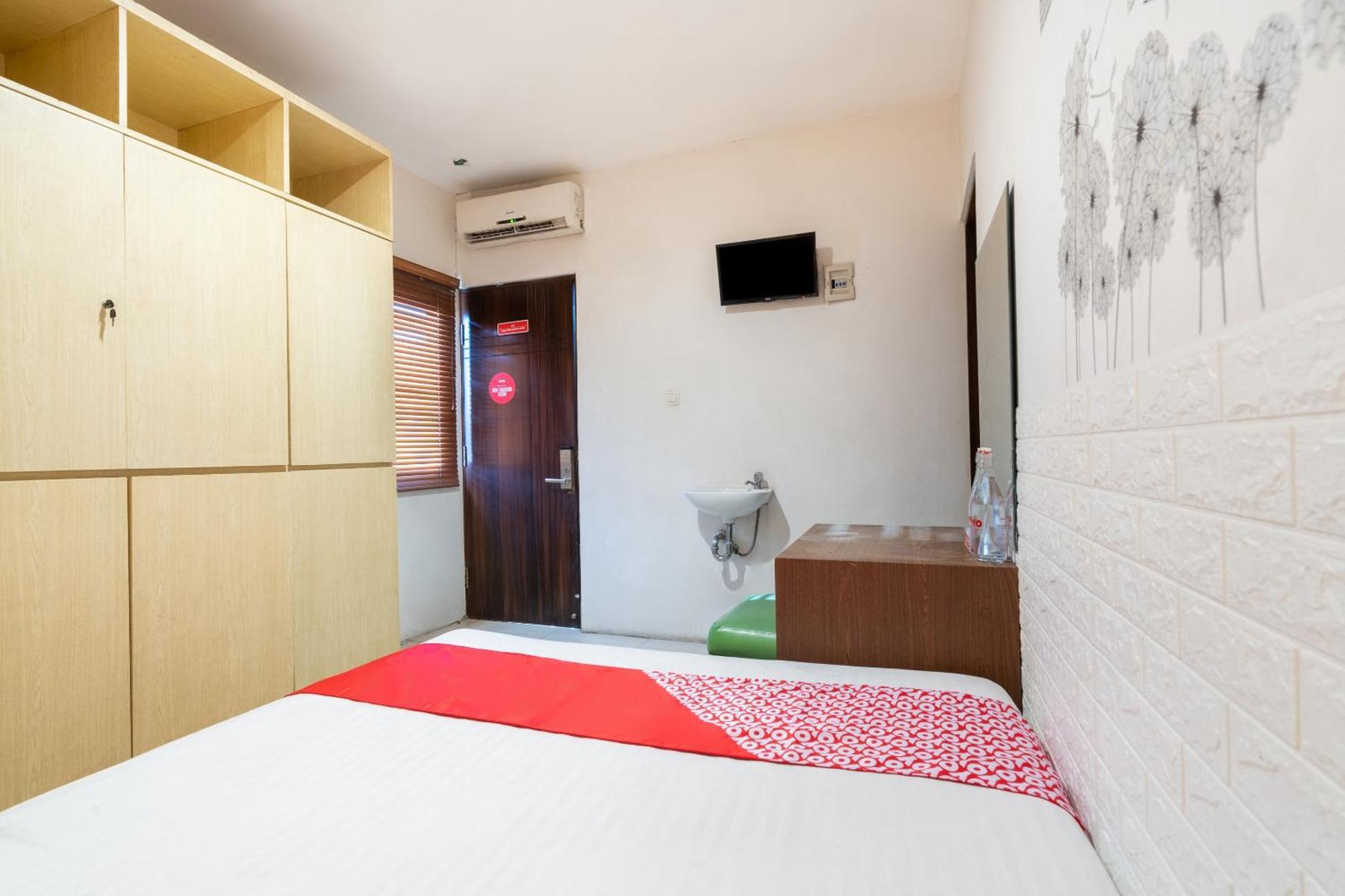 Super Oyo Flagship 91863 Metro House Ξενοδοχείο Σουραμπάγια Εξωτερικό φωτογραφία